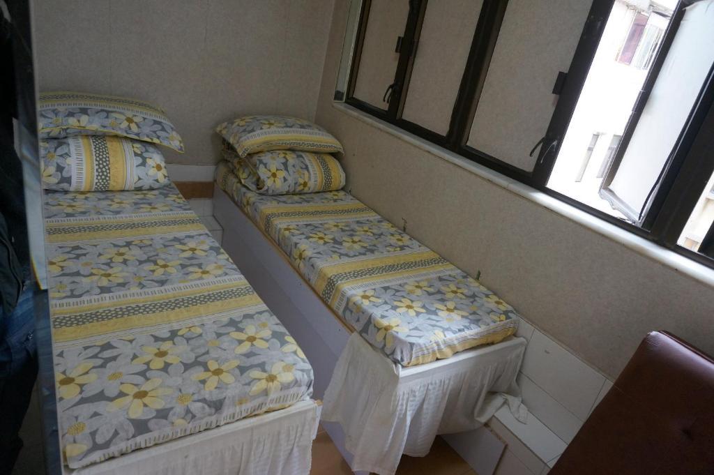Lucky Comfort Inn Цзюлун Номер фото